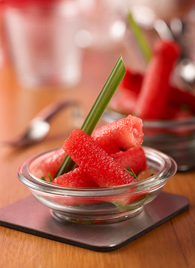 Cilindros de patilla con sirope de limonaria